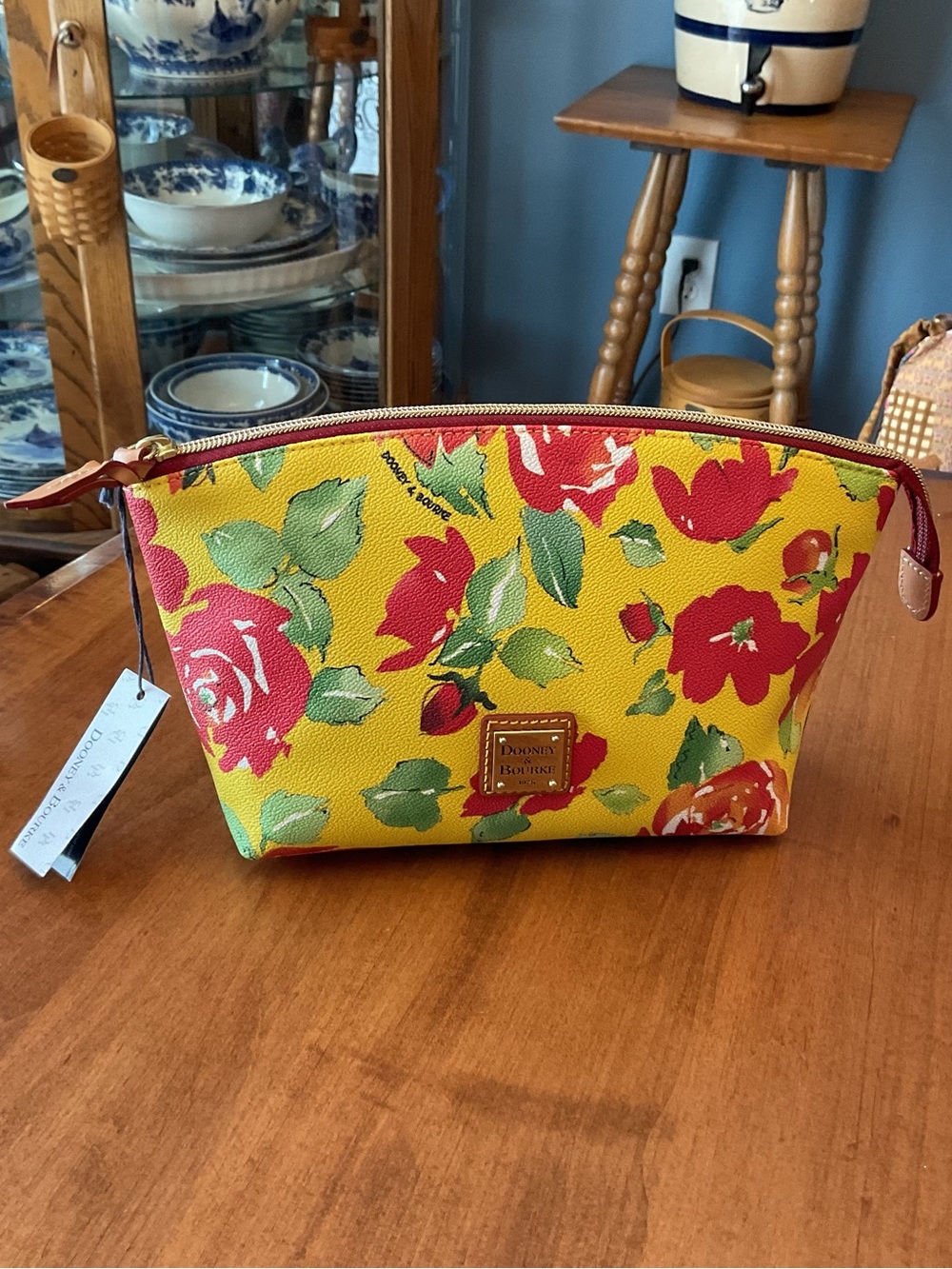 Dooney & Bourke Yellow Floral Cosmetic Case with Red and Green Accents NWT